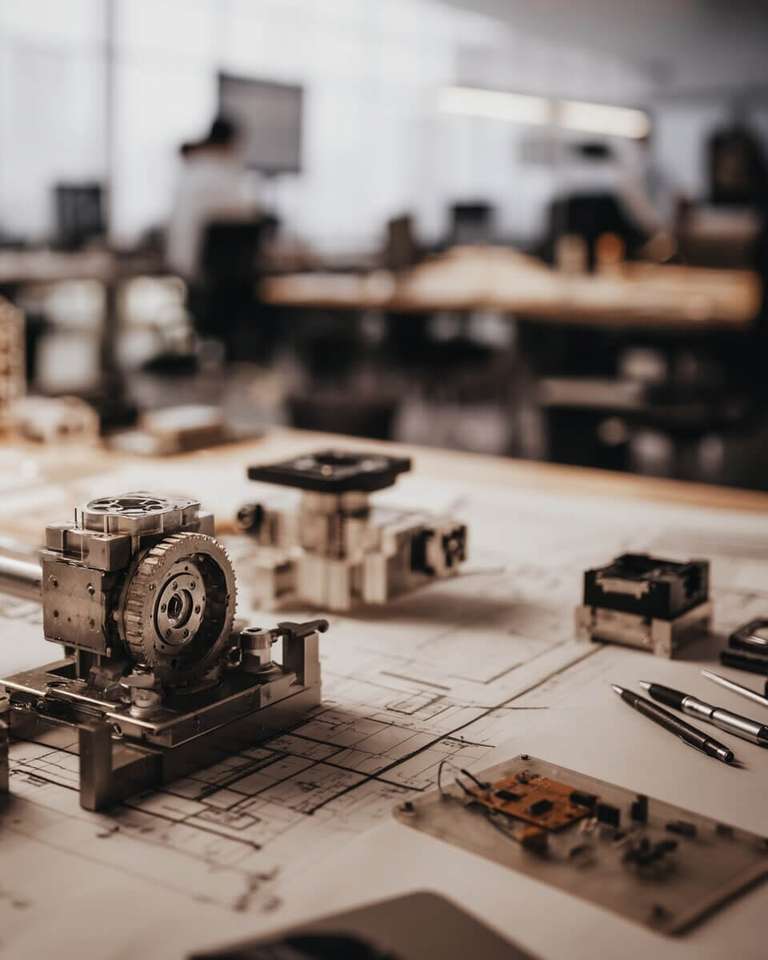 Prototype development with fabrication planning and design-for-build readiness